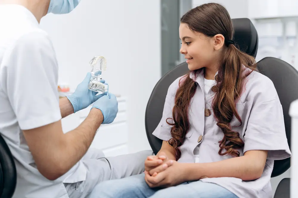 dentist communicates with his patient shows on th 2022 12 16 11 30 42 utc 1