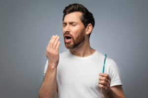 首頁 19 bad breath handsome middle aged man checking his 2023 02 21 19 40 30 utc 1